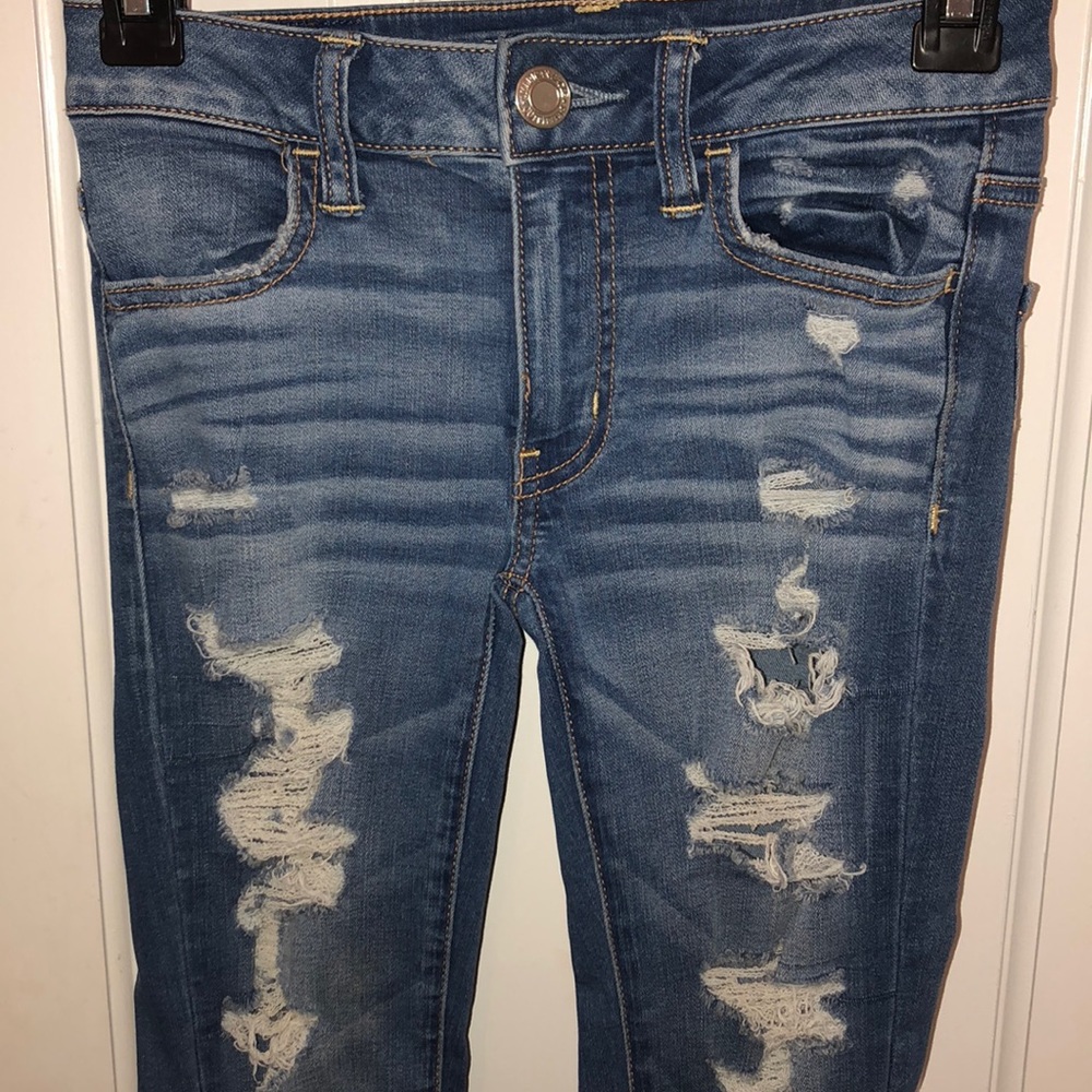 skinny blue jeans with rips